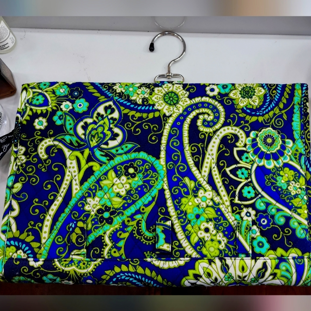 A Vera Bradley travel Jewelry organizer.
